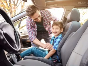 child legally sit in front seat